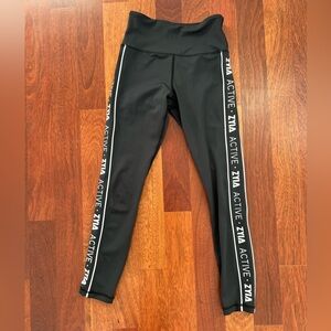 ZYIA Black Leggings with Zyia logos down both legs